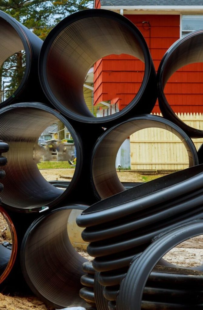 Preparation for installation plastic pipes for the stacked black plastic industrial tubes sewage system